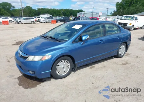 2009 Honda Civic Hybrid from USA, damaged, VIN JHMFA36219S017973